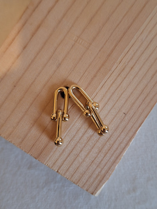 Boucle d'oreille ODE Doré